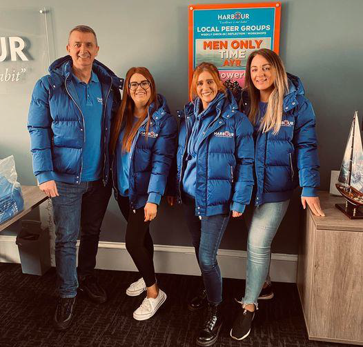 Harbour Ayrshire staff demonstrating their new winter uniform jackets