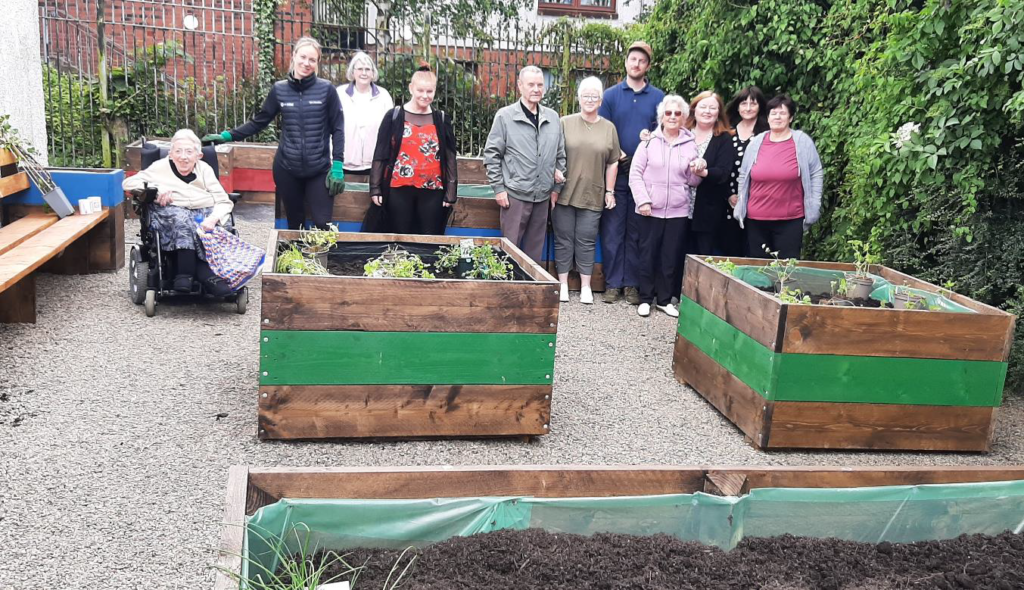 North Ayrshire Forum on Disability staff and client users with Alex Conder (Sustainability and Print Account Manager, HP Inc.) and Nick Trull (Ecologist and RePollinate Manager) in the new community garden